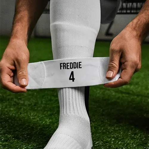 Football ankle straps for securing shin pads